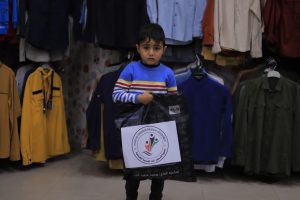 جمعية فلسطين الغد توزع «كسوة العيد» على الأطفال المحتــاجين بقطاع غزة