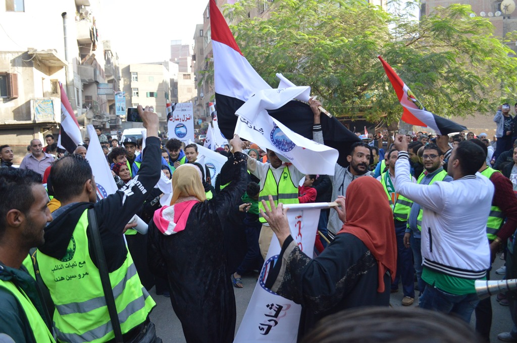 خاص بالصور| انتخابات الرئاسة 2024.. أجواء احتفالية أمام مدرسة البحوث بالدقي