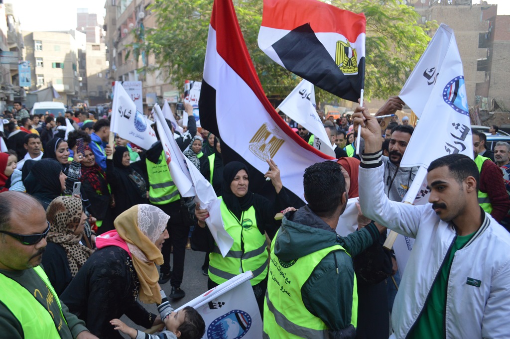 خاص بالصور| انتخابات الرئاسة 2024.. أجواء احتفالية أمام مدرسة البحوث بالدقي